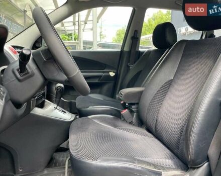 Сірий Хендай Туксон, об'ємом двигуна 2 л та пробігом 240 тис. км за 10790 $, фото 15 на Automoto.ua