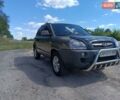 Серый Хендай Туксон, объемом двигателя 2 л и пробегом 159 тыс. км за 8800 $, фото 2 на Automoto.ua