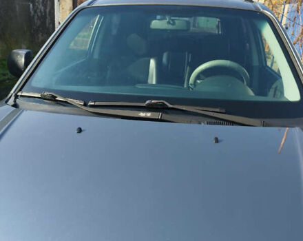 Серый Хендай Туксон, объемом двигателя 2 л и пробегом 168 тыс. км за 9499 $, фото 4 на Automoto.ua