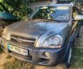 Серый Хендай Туксон, объемом двигателя 1.98 л и пробегом 195 тыс. км за 8800 $, фото 1 на Automoto.ua