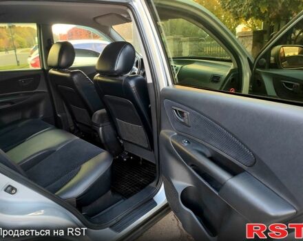 Сірий Хендай Туксон, об'ємом двигуна 2 л та пробігом 147 тис. км за 9800 $, фото 10 на Automoto.ua