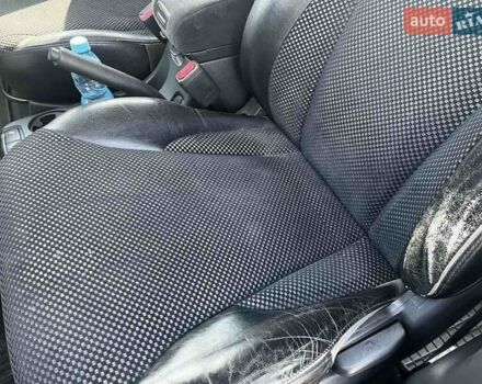 Серый Хендай Туксон, объемом двигателя 1.98 л и пробегом 373 тыс. км за 6800 $, фото 2 на Automoto.ua