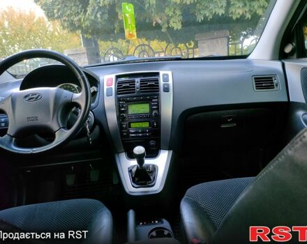 Сірий Хендай Туксон, об'ємом двигуна 2 л та пробігом 147 тис. км за 9800 $, фото 5 на Automoto.ua