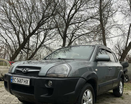 Серый Хендай Туксон, объемом двигателя 1.99 л и пробегом 209 тыс. км за 8200 $, фото 4 на Automoto.ua