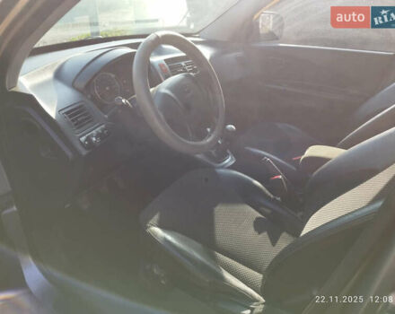 Серый Хендай Туксон, объемом двигателя 2 л и пробегом 168 тыс. км за 9499 $, фото 6 на Automoto.ua