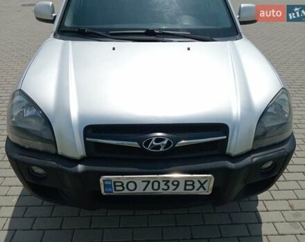 Серый Хендай Туксон, объемом двигателя 1.98 л и пробегом 131 тыс. км за 10650 $, фото 14 на Automoto.ua