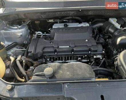 Серый Хендай Туксон, объемом двигателя 1.98 л и пробегом 373 тыс. км за 6800 $, фото 6 на Automoto.ua