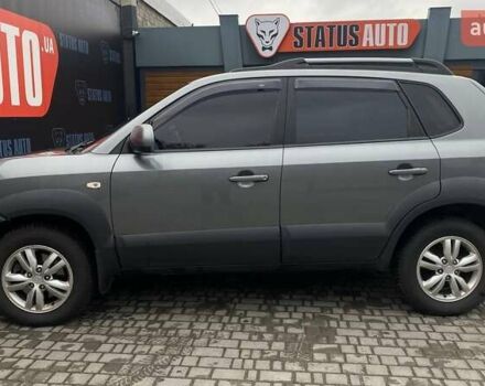 Серый Хендай Туксон, объемом двигателя 1.98 л и пробегом 174 тыс. км за 9500 $, фото 7 на Automoto.ua