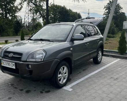 Серый Хендай Туксон, объемом двигателя 1.98 л и пробегом 270 тыс. км за 10310 $, фото 2 на Automoto.ua