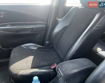 Серый Хендай Туксон, объемом двигателя 1.98 л и пробегом 373 тыс. км за 6800 $, фото 11 на Automoto.ua