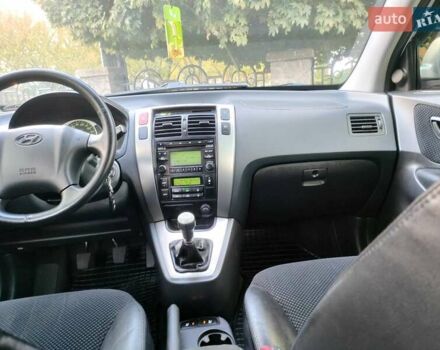 Хендай Туксон 2011 в Сумах на Automoto.ua Серый Хендай Туксон, объемом двигателя 2 л и пробегом 147 тыс. км за 9800 $, фото 12 на Automoto.ua