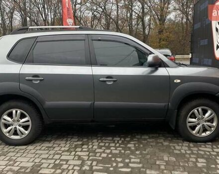Серый Хендай Туксон, объемом двигателя 1.98 л и пробегом 174 тыс. км за 9500 $, фото 9 на Automoto.ua