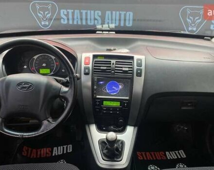 Серый Хендай Туксон, объемом двигателя 1.98 л и пробегом 174 тыс. км за 9500 $, фото 26 на Automoto.ua