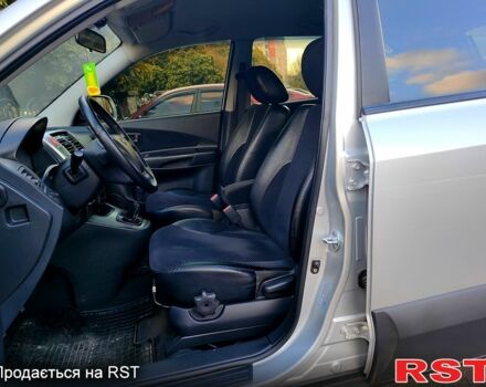 Сірий Хендай Туксон, об'ємом двигуна 2 л та пробігом 147 тис. км за 9800 $, фото 3 на Automoto.ua