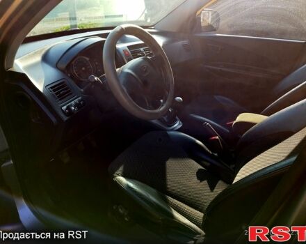 Серый Хендай Туксон, объемом двигателя 2 л и пробегом 178 тыс. км за 10000 $, фото 2 на Automoto.ua