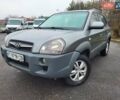 Серый Хендай Туксон, объемом двигателя 2 л и пробегом 213 тыс. км за 10400 $, фото 1 на Automoto.ua