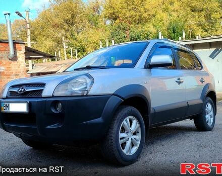 Сірий Хендай Туксон, об'ємом двигуна 2 л та пробігом 147 тис. км за 9800 $, фото 13 на Automoto.ua