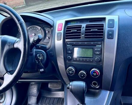 Серый Хендай Туксон, объемом двигателя 2 л и пробегом 165 тыс. км за 10000 $, фото 6 на Automoto.ua