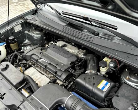 Серый Хендай Туксон, объемом двигателя 2 л и пробегом 150 тыс. км за 9900 $, фото 12 на Automoto.ua