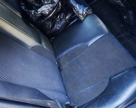 Серый Хендай Туксон, объемом двигателя 2 л и пробегом 255 тыс. км за 9500 $, фото 1 на Automoto.ua