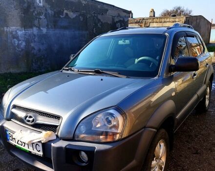 Серый Хендай Туксон, объемом двигателя 2 л и пробегом 178 тыс. км за 10000 $, фото 5 на Automoto.ua