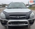 Сірий Хендай Туксон, об'ємом двигуна 1.98 л та пробігом 149 тис. км за 9650 $, фото 4 на Automoto.ua