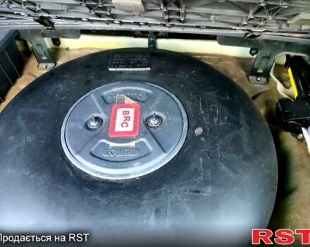 Сірий Хендай Туксон, об'ємом двигуна 2 л та пробігом 147 тис. км за 9800 $, фото 11 на Automoto.ua