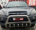 Серый Хендай Туксон, объемом двигателя 1.98 л и пробегом 174 тыс. км за 9500 $, фото 1 на Automoto.ua