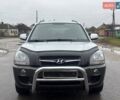 Сірий Хендай Туксон, об'ємом двигуна 1.98 л та пробігом 149 тис. км за 9650 $, фото 3 на Automoto.ua