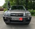 Серый Хендай Туксон, объемом двигателя 2 л и пробегом 145 тыс. км за 10790 $, фото 1 на Automoto.ua