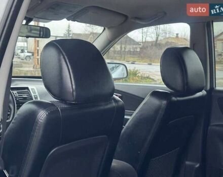 Сірий Хендай Туксон, об'ємом двигуна 1.98 л та пробігом 149 тис. км за 9650 $, фото 6 на Automoto.ua