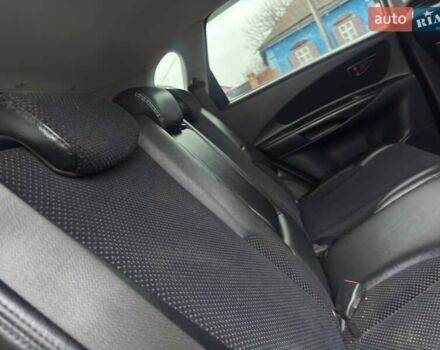 Сірий Хендай Туксон, об'ємом двигуна 1.98 л та пробігом 149 тис. км за 9650 $, фото 13 на Automoto.ua