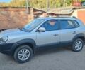 Серый Хендай Туксон, объемом двигателя 2 л и пробегом 146 тыс. км за 9850 $, фото 1 на Automoto.ua