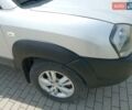 Серый Хендай Туксон, объемом двигателя 1.98 л и пробегом 131 тыс. км за 10650 $, фото 8 на Automoto.ua
