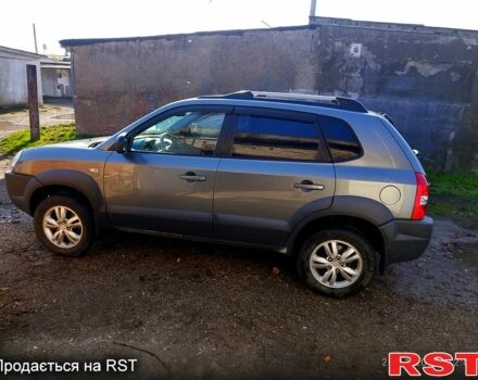 Серый Хендай Туксон, объемом двигателя 2 л и пробегом 178 тыс. км за 10000 $, фото 3 на Automoto.ua