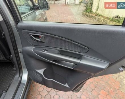 Сірий Хендай Туксон, об'ємом двигуна 1.98 л та пробігом 209 тис. км за 8700 $, фото 21 на Automoto.ua