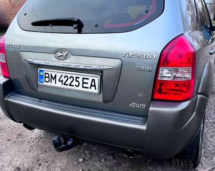 Серый Хендай Туксон, объемом двигателя 2 л и пробегом 165 тыс. км за 10000 $, фото 1 на Automoto.ua