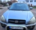 Серый Хендай Туксон, объемом двигателя 2 л и пробегом 165 тыс. км за 10000 $, фото 8 на Automoto.ua