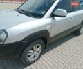 Серый Хендай Туксон, объемом двигателя 1.98 л и пробегом 131 тыс. км за 10650 $, фото 4 на Automoto.ua