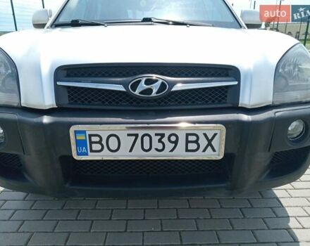 Серый Хендай Туксон, объемом двигателя 1.98 л и пробегом 131 тыс. км за 10650 $, фото 7 на Automoto.ua