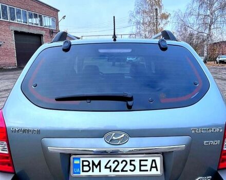 Серый Хендай Туксон, объемом двигателя 2 л и пробегом 165 тыс. км за 10000 $, фото 7 на Automoto.ua
