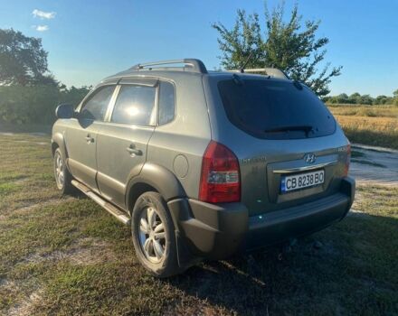 Сірий Хендай Туксон, об'ємом двигуна 2 л та пробігом 256 тис. км за 8900 $, фото 4 на Automoto.ua