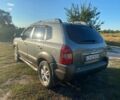 Сірий Хендай Туксон, об'ємом двигуна 2 л та пробігом 256 тис. км за 8900 $, фото 4 на Automoto.ua