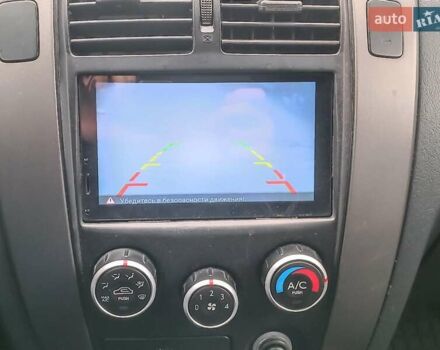 Серый Хендай Туксон, объемом двигателя 2 л и пробегом 148 тыс. км за 10390 $, фото 24 на Automoto.ua