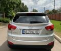 Серый Хендай Туксон, объемом двигателя 2.4 л и пробегом 164 тыс. км за 12500 $, фото 9 на Automoto.ua