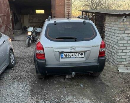 Серый Хендай Туксон, объемом двигателя 2 л и пробегом 175 тыс. км за 10200 $, фото 5 на Automoto.ua