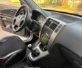 Серый Хендай Туксон, объемом двигателя 2 л и пробегом 113 тыс. км за 11200 $, фото 13 на Automoto.ua