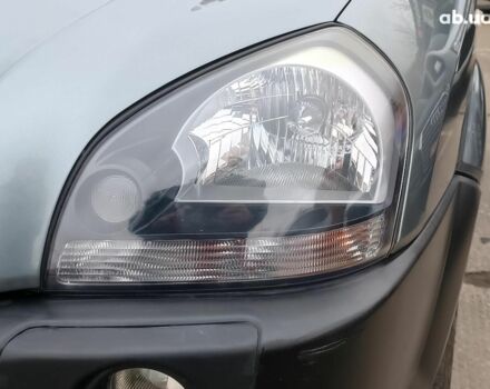 Сірий Хендай Туксон, об'ємом двигуна 2 л та пробігом 148 тис. км за 10390 $, фото 4 на Automoto.ua