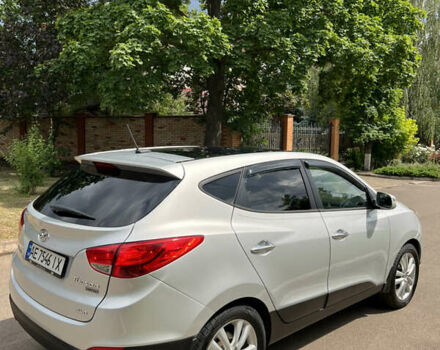 Серый Хендай Туксон, объемом двигателя 2.4 л и пробегом 164 тыс. км за 13200 $, фото 4 на Automoto.ua