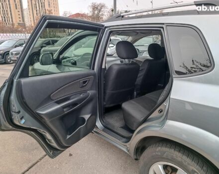 Сірий Хендай Туксон, об'ємом двигуна 2 л та пробігом 148 тис. км за 10390 $, фото 12 на Automoto.ua